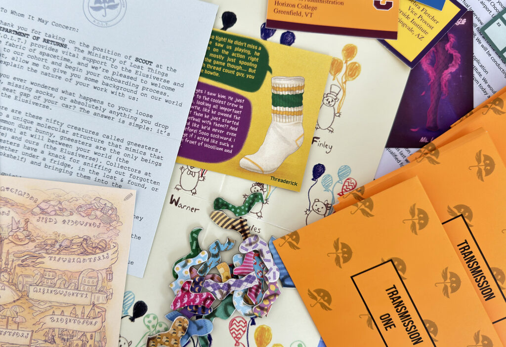 A colorful assortment of papers and items, including a typewritten letter, illustrated cards with socks, whimsical creatures, and orange envelopes labeled "TRANSMISSION ONE." Decorative ribbons and a map suggest a Narrative Puzzle Game by the Ministry of Lost Things, perfect for your next Kickstarter project.